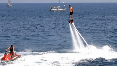 Acrobatics with flyboard. Stock Footage 106508048