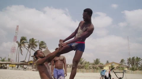 Acrobats On A Beach Stockbeeldmateriaal 242632344