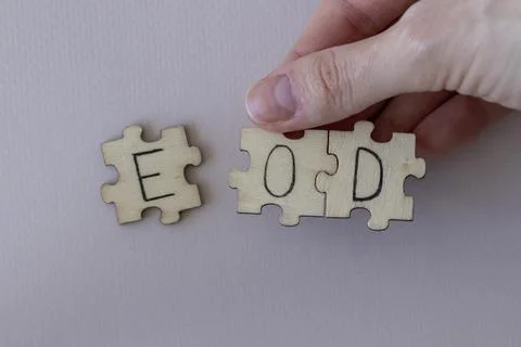 The acronym EOD, which stands for End Of Day. The letters written on the puzzles Stock Photos