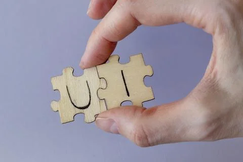 The acronym UI, which stands for User Interface. The letters written on the Stock Photos