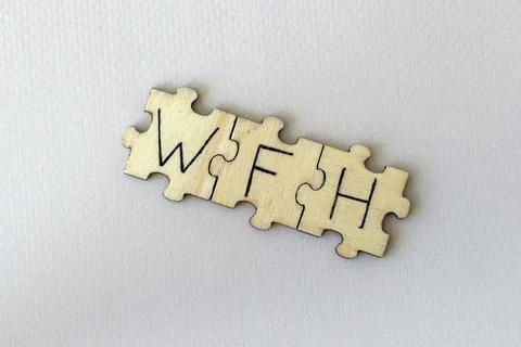 The acronym WFH, which stands for Work From Home. The letters written on the Stock Photos