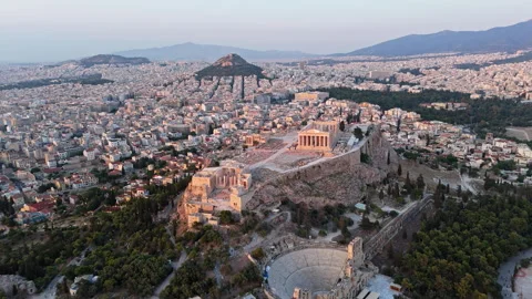Acropolis of Athens with Parthenon and Odeon Above Dense Urban Neighborhoods Video stock 341473364