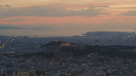 Acropolis lights up at sunset/dusk skyline overview real time wide view Stock Footage 47486403