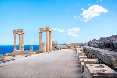 Acropolis of Lindos - View of Doric columns and statue bases on the right sid Stock Photos