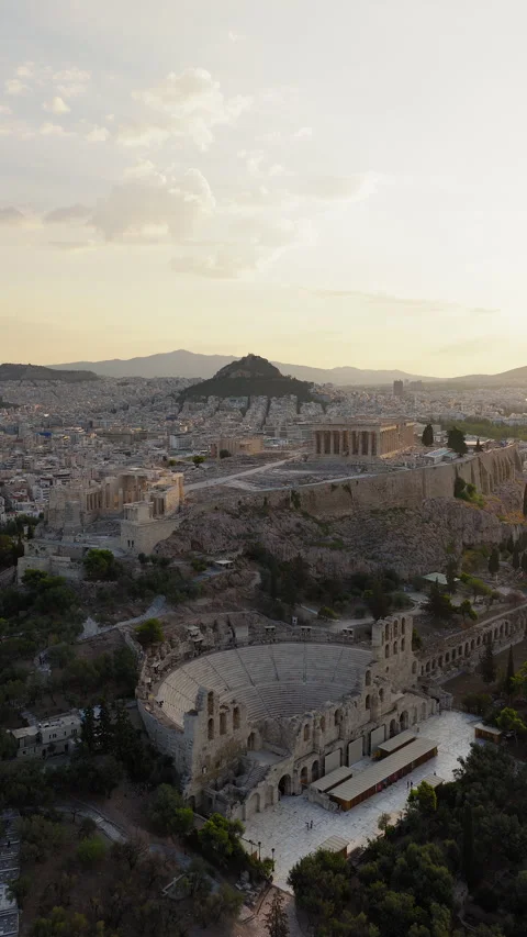 Acropolis Parthenon Odeon of Herodes Atticus amphitheatre Athens Greece aerial Video stock 327839886