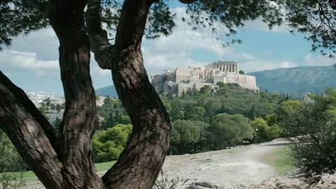 Acropolis Parthenon Tracking Left View Thru Trees Pnyx Hill Athens Stock Footage 106433425
