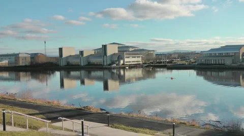 Across River Queens Campus, Durham University reflected in water Stock Footage 1064786