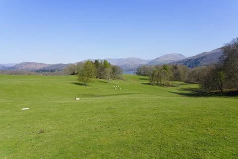 Across undulating fields down to Lake Windermere and beyond. Stock Photos