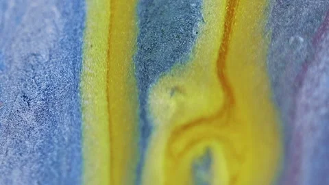 Acrylic drip glitter paint spill golden blue ink Video stock 279700502