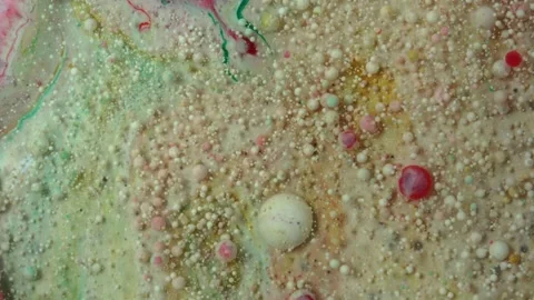 Acrylic paint macro. Abstract art Orange Red colors bubbles Stock Footage 150689663