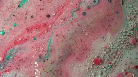 Acrylic paint macro. Abstract art Orange Red colors bubbles Stock Footage 150690416