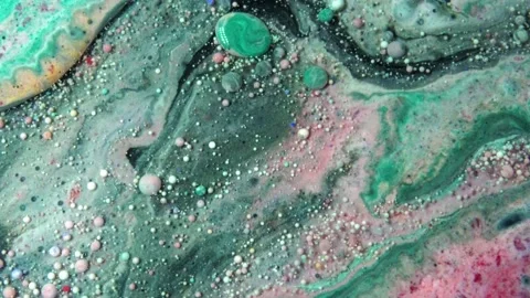 Acrylic paint macro. Abstract art Orange Red colors bubbles Stock Footage 150690911