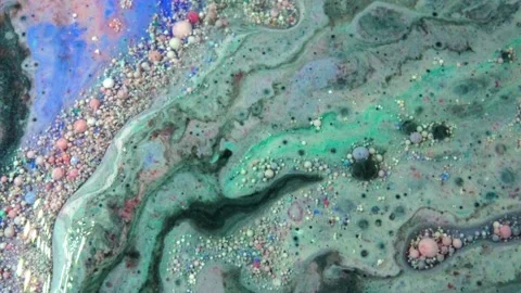 Acrylic paint macro. Abstract art Orange Red colors bubbles Stock Footage 150690946