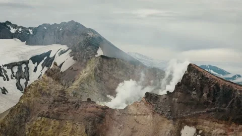 Acsent to Mutnovsky Volcano Active Crater Ridge, Kamchatka Stock Footage 167113482