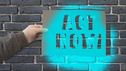 Act Now! - graffiti stencil Stock Footage 121131635