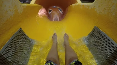 Action Cam on the waterslide, Yellow Stock Footage 94241586