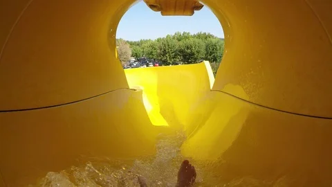 Action Cam on the waterslide, Yellow Stock Footage 94241655
