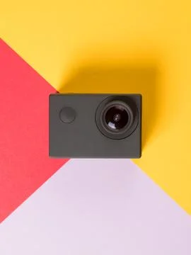 Action camera on colored background Foto stock