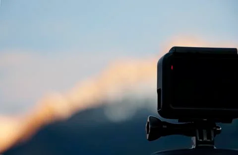 Action camera concept with blurred hills in the background Stock Photos