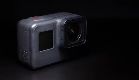 Action camera on a dark background. Isolated object. Front view. 写真素材