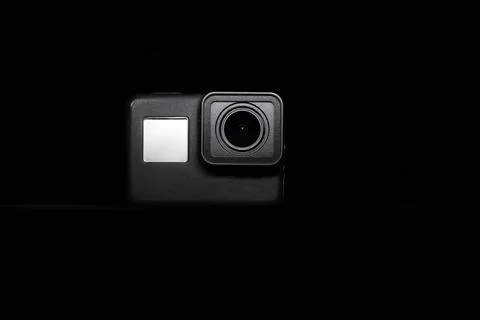 Action camera on a dark background. Isolated object. Front view. 写真素材
