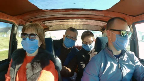 Action camera shot from a family in protective masks during an epidemic. Stock Footage 127941548