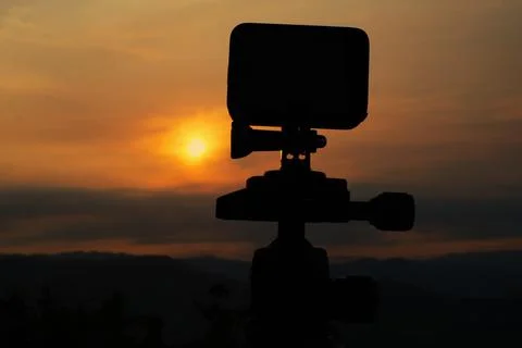 Action camera with sunset background Stock Photos