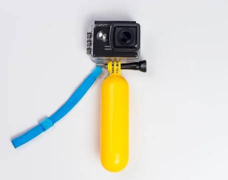 Action Camera in Water Proof case with floating stick Stock Photos