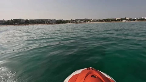 Action camera wide angle pov shot of man riding jet ski Stock Footage 314340531