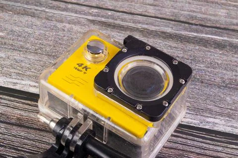 Action camera on wooden table Foto stock