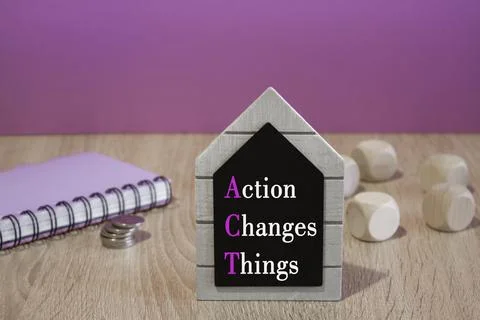 Action, Changes and Things symbol. On black board concept words Stock Photos