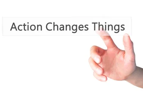 Action Changes Things - Hand pressing a button on blurred background concept  Stock Photos