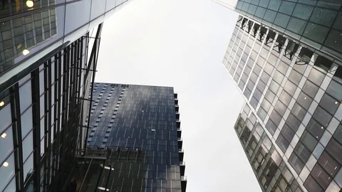 Action dramatic change of perspective going up revealing high buildings in Stock Footage 127313403