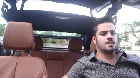 ACTION - getting into the convertible Stock Footage 65188201