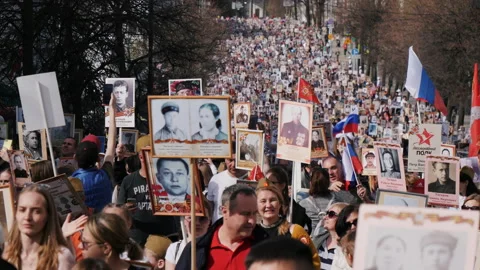 Action Immortal Regiment, people go with portraits of their deceased ancestors Stock Footage 201479217