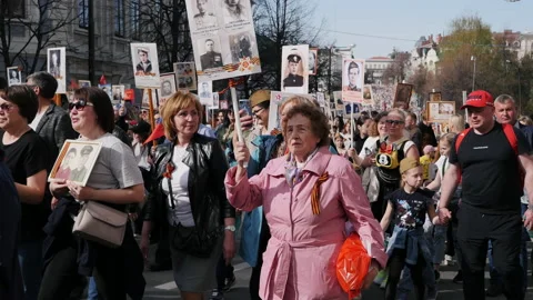 Action Immortal Regiment, people go with portraits of their deceased ancestors Stock Footage 201479224