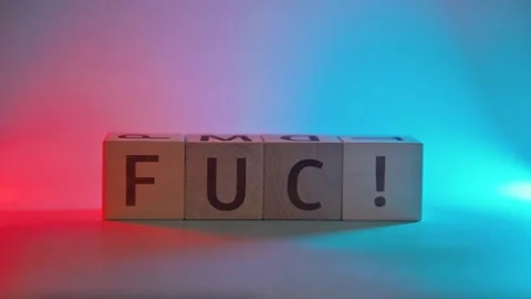 The action involves colorful blocks being arranged to form bold letters against Stock Footage 338187737