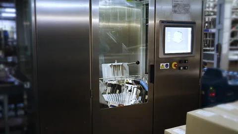 The action of making and manufacturing from components. Making plastic straws Stock Footage 155029358