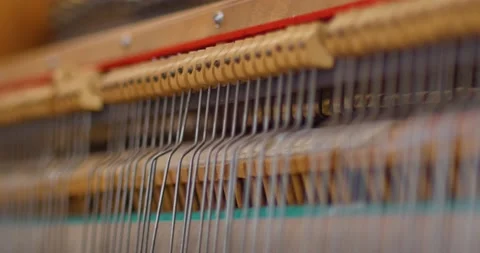 Action mechanics hammer closeup inside of an upright piano Stock Footage 164216868