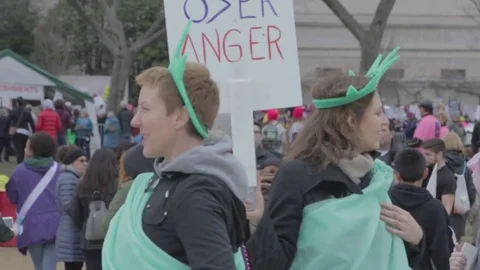 Action Over Anger Protest Sign - Womens March Vídeos de archivo 81252874