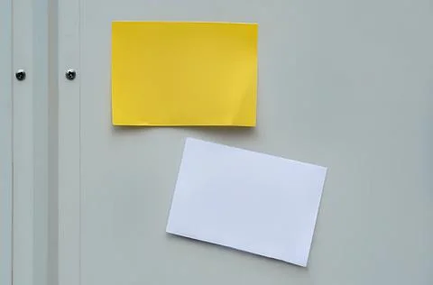 Action plan concept. Yellow and white sticky notes isolated on light background Stock Photos