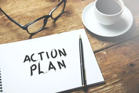 Action plan text on notepad Stock Photos