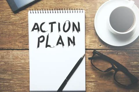 Action plan text on notepad Stock Photos