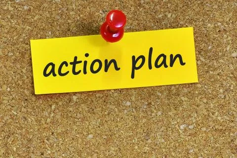 Action plan  word on notes paper with cork background Foto stock