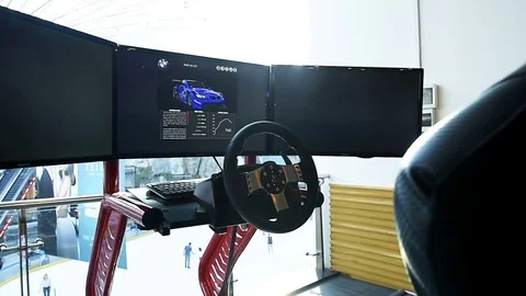 Action racing video game man playing at car simulator Stock Footage 75691560