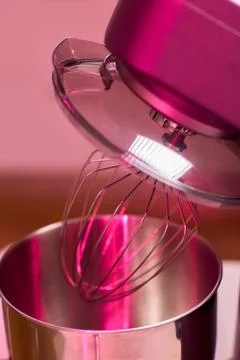An action shot of a kitchen mixer in the process of being used for baking, sh Stock Photos