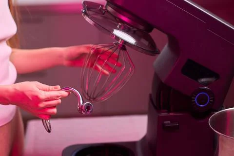 An action shot of a kitchen mixer in the process of being used for baking, sh Stock Photos
