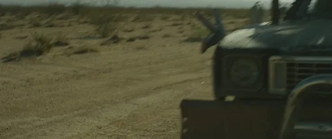 Action Shot of Mad Max-inspired Car Driving 動画素材 90724265