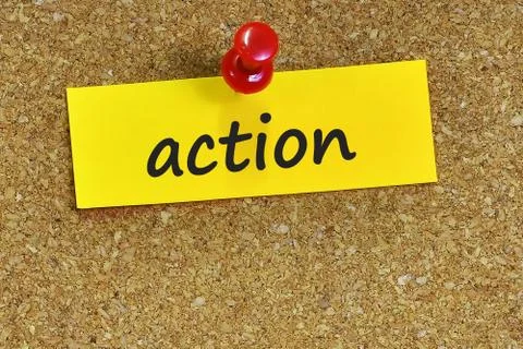 Action  word on notes paper with cork background Foto stock