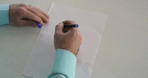 Action  -  this word is written on the sheet by a man's hand Stock Footage 267081903